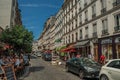 People having fun in MontmartreÃ¢â¬â¢s restaurant in sunny day at Paris.